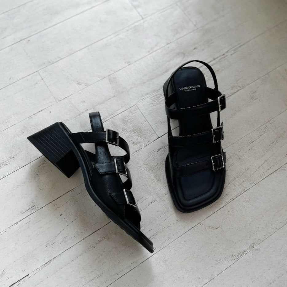 VAGABOND SHOEMAKERS- INES HEELED SANDAL IN BLACK LEATHER